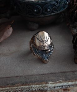 Alternative view of The Symbiote ring